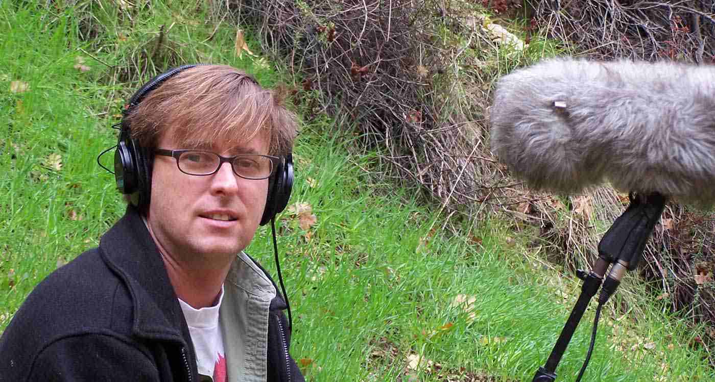 Charles Maynes operating boom microphone outdoors