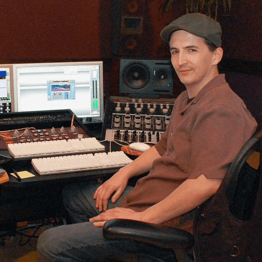 Warren Sokol sat in a mixing studio with a Sonnox plugin on the computer screen